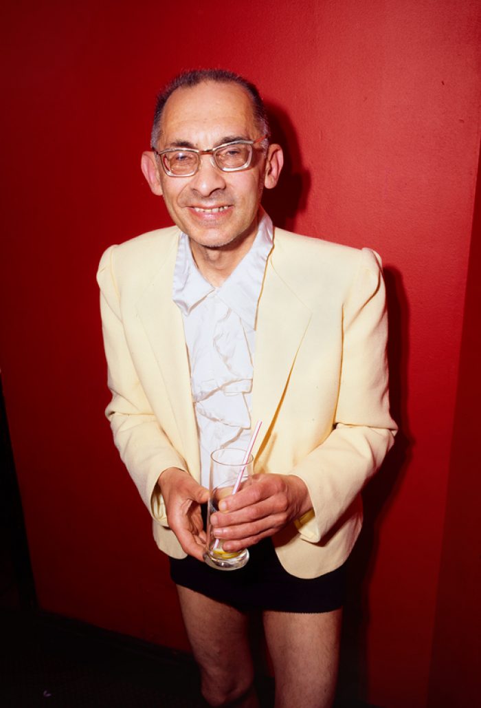 Man in mini skirt at Madame JoJo's